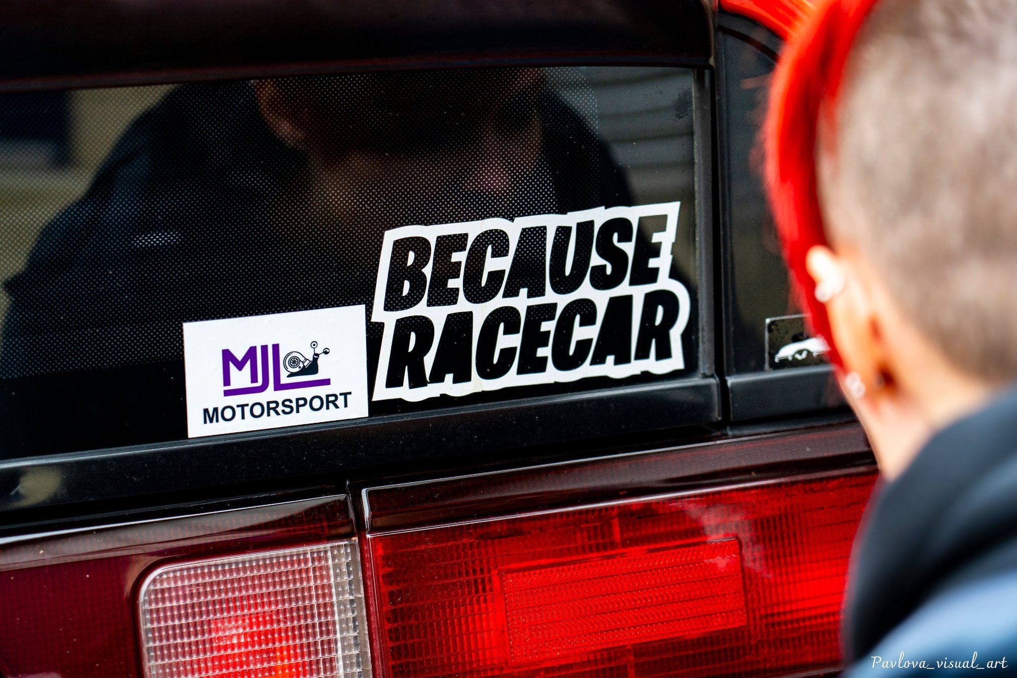 MJL Motorsport sticker next to Because Racecar sticker on the window of the Honda CRX