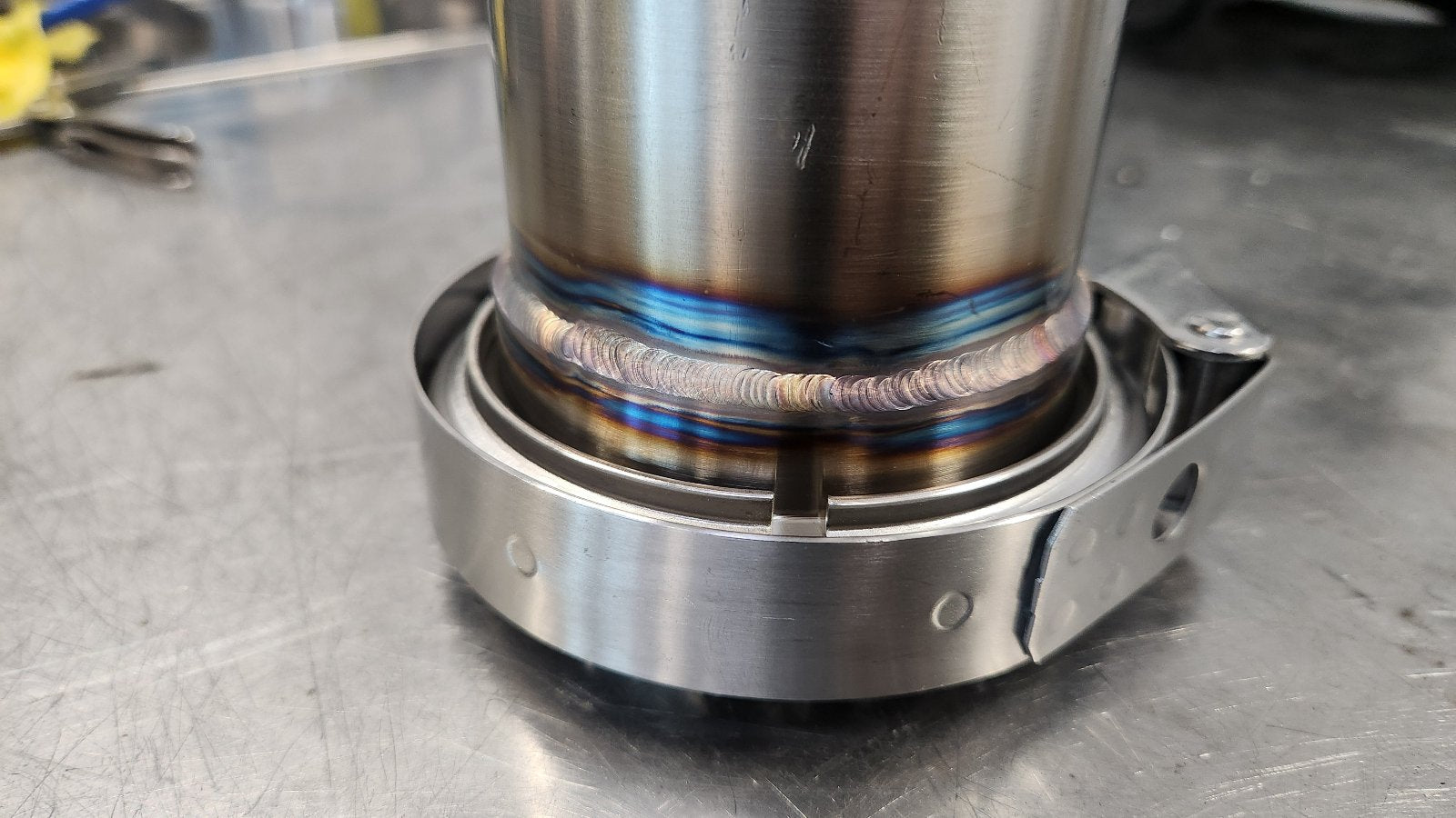 Close up of very beautiful rainbow welds on this Tig welded exhaust.